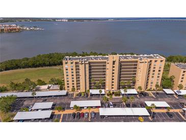 High-rise waterfront condo featuring covered parking and a beautiful water view at 2618 Cove Cay Dr # 801, Clearwater, FL 33760