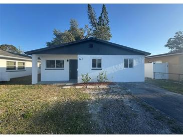 Charming single-story home with a fresh white exterior and dark trim at 342 51St N Ave, St Petersburg, FL 33703