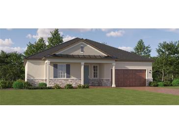 Inviting single-story home featuring a stone facade, attached garage, and well-manicured lawn at 9396 Minnow Ray Dr, Land O Lakes, FL 34638