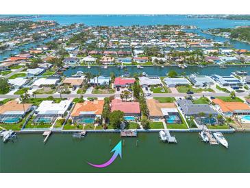 Waterfront homes showcase direct access to the bay, complemented by private docks and lush landscaping in this coastal community at 4490 38Th S Way, St Petersburg, FL 33711