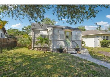 Well maintained front yard with mature landscaping at 3611 4Th N Ave, St Petersburg, FL 33713