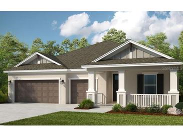 Charming single-story home featuring a two-car garage and a welcoming front porch at 3407 Lumber Falls Dr, Plant City, FL 33565
