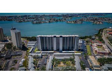Stunning aerial view of a modern high-rise building, with coastal views and covered parking at 7050 Sunset S Dr # 912, South Pasadena, FL 33707