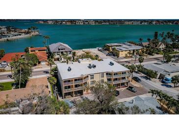 Waterfront condo building boasts stunning views, private balconies, and easy access to amenities at 1700 Pass A Grille Way # 9, St Pete Beach, FL 33706