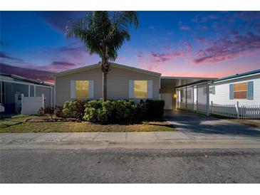 Charming single-story home with well-maintained landscaping and convenient covered parking in a desirable neighborhood at 8528 Fantasia Park Way, Riverview, FL 33578