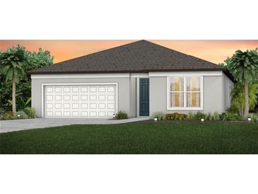 Charming one-story home with a neatly manicured lawn, garage, and freshly planted landscaping at 9740 Redwood Heights Loop, Thonotosassa, FL 33592