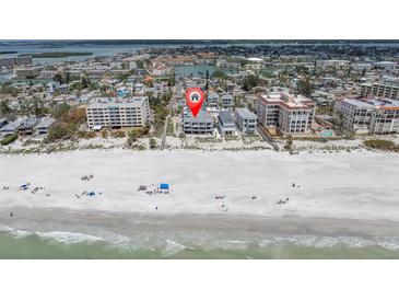 Stunning beachfront home boasts panoramic ocean views and private beach access at 12274 1St W St # 2, Treasure Island, FL 33706