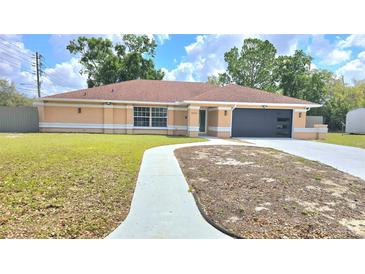 Charming single-story home with a well-manicured lawn and inviting walkway, perfect for suburban living at 8054 Spring Hill Dr, Spring Hill, FL 34606