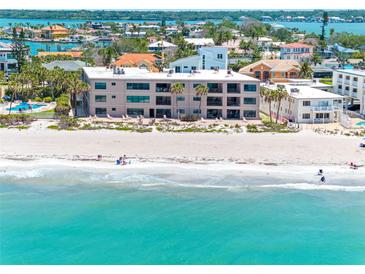 Beachfront condo building with amazing views of the gulf and white sands at 3210 Gulf Blvd # 108, Belleair Beach, FL 33786