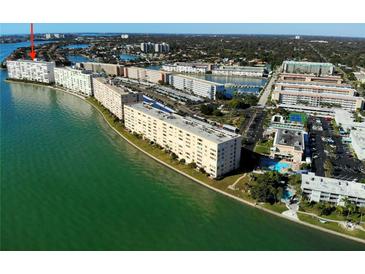 Stunning aerial view of waterfront condos offering beautiful views and convenient access to coastal amenities at 6060 Shore S Blvd # 302, Gulfport, FL 33707