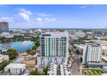 Stunning aerial view of a modern high-rise condo building with views of the lake and city skyline at 777 3Rd N Ave # 1308, St Petersburg, FL 33701