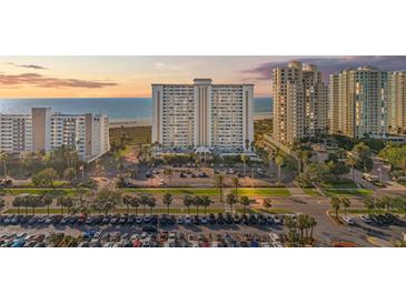 Stunning high-rise condo building with ocean views and well-maintained parking and landscaping at 1230 Gulf Blvd # 508, Clearwater Beach, FL 33767