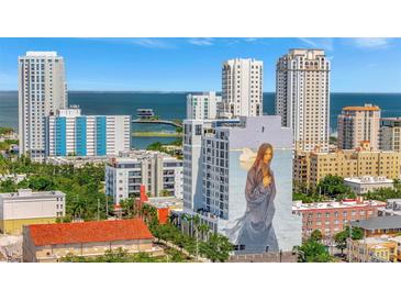 Wonderful city view of the skyline and Tampa Bay with a colorful mural and blue skies at 226 5Th N Ave # 605, St Petersburg, FL 33701
