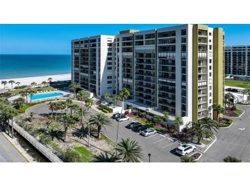 Stunning beachfront condo building with a pool, parking, and beautiful ocean views at 1480 Gulf Blvd # 103, Clearwater Beach, FL 33767