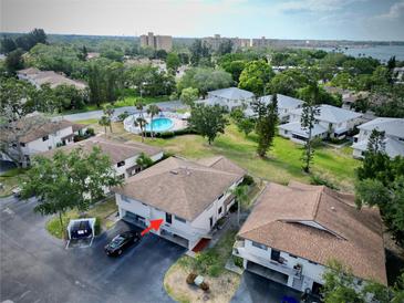 Exterior aerial showcases building's parking and surrounding landscape at 1821 Bough Ave # 4, Clearwater, FL 33760