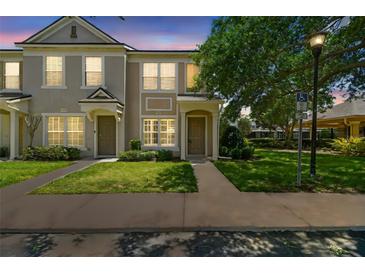 Inviting townhome with well-maintained lawn and neutral-toned facade for a cozy curb appeal at 4516 Barnstead Dr, Riverview, FL 33578