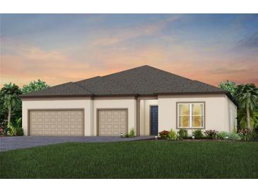 Charming single-story home featuring a three-car garage, well-maintained lawn, and inviting front entrance at 11423 Shoreline Trl, Parrish, FL 34219