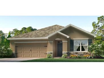 Charming single-story home with a two-car garage, landscaped yard, and neutral color palette at 3335 Ivy Hollow Dr, Plant City, FL 33565
