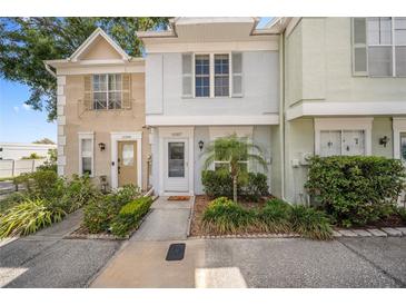 Charming townhome with well-kept landscaping and inviting front entrance at 11357 Stratton Park Dr # 11357, Temple Terrace, FL 33617