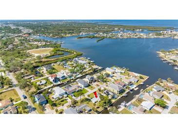 Waterfront property featuring canal access, community docks and a beautiful waterfront community at 5425 Bluepoint Dr, Port Richey, FL 34668