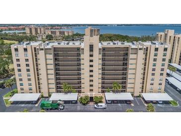 Spacious condo building with covered parking, a well maintained lawn, and amazing views at 2621 Cove Cay Dr # 204, Clearwater, FL 33760