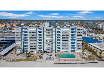 Beachfront condo building with a pool and ocean views in a desirable coastal location at 17400 Gulf Blvd # I4, North Redington Beach, FL 33708