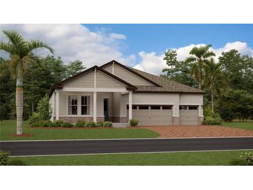 Charming one-story home with a well-manicured lawn, inviting porch, and a three-car garage at 4923 Southern Valley Loop, Brooksville, FL 34601