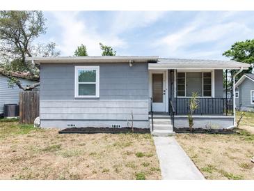 Inviting home with a well-maintained exterior and a charming walkway leading to the entrance at 3253 57Th N Ave, St Petersburg, FL 33714