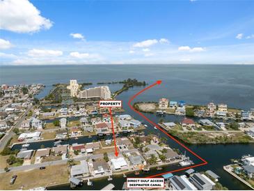 Aerial view of waterfront property with direct access to the gulf at 13810 Malcolm Ave, Hudson, FL 34667