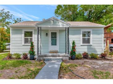 Charming single-story home with a well-manicured front yard and covered entry for added curb appeal at 1419 55Th S St, Gulfport, FL 33707