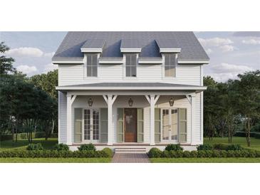 Charming two-story home features a covered porch with columns and classic design at 510 35Th N Ave, St Petersburg, FL 33704