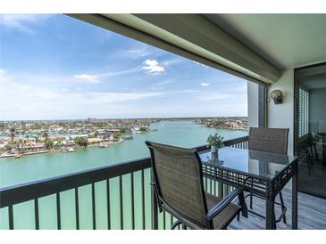 Relax on the balcony and enjoy stunning waterfront views in this coastal community at 9495 Blind Pass Rd # 907, St Pete Beach, FL 33706