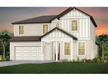 This new construction home boasts vertical siding, and a covered porch entry for a stylish curb appeal at 10537 Longmeadow Ave, Parrish, FL 34219