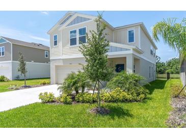 Charming two-story home with manicured lawn and well-maintained landscaping at 7721 Twin Leaf Ter, Parrish, FL 34219
