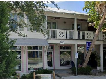Charming multi-story building with a quaint design and street-side appeal at 216 Pine Ave # R, Anna Maria, FL 34216