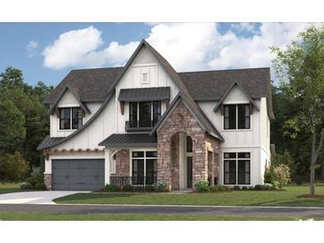 Stunning two-story home featuring stone accents and a modern farmhouse design at 4224 W Corona St, Tampa, FL 33629