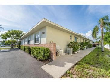 Inviting multi-unit complex with lush greenery and well-maintained landscaping at 1021 Apollo Beach Blvd # 6, Apollo Beach, FL 33572