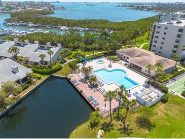 Wonderful aerial view of the community pool, water access, and Intracoastal Waterway views at 1328 Pasadena S Ave # 608, South Pasadena, FL 33707