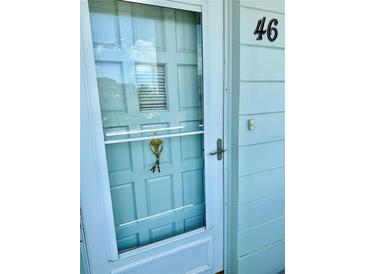 A close up of the front door with the house number 46 at 2254 Norwegian Dr # 46, Clearwater, FL 33763