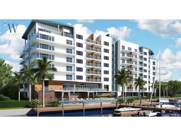 Stunning waterfront condo with balconies, pool and boat dock at 411 E Shore Drive # 202, Clearwater Beach, FL 33767