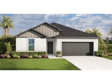 Charming single-story home featuring a two-car garage, landscaped front yard, and neutral color palette at 4086 Polynesia Rd, North Port, FL 34288