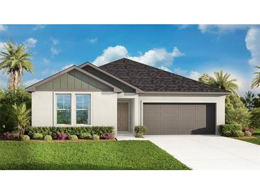 Charming single-story home featuring a well-manicured lawn, two-car garage, and classic architectural details at 4810 Prime Ter, North Port, FL 34286