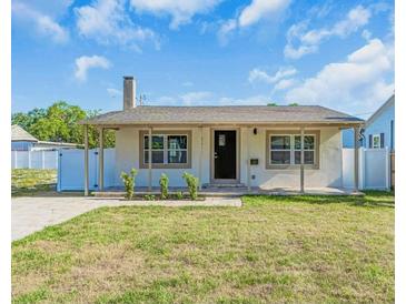 Charming single-story home featuring neutral paint, updated windows, and a well-maintained front yard at 2511 18Th N Ave, St Petersburg, FL 33713