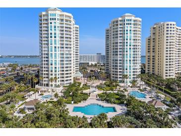 Luxury high-rise condos featuring multiple pools, lush landscaping, and beautiful views of the bay at 1170 Gulf Blvd # 2101, Clearwater Beach, FL 33767