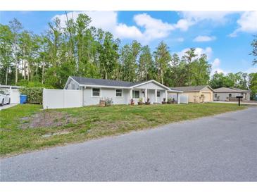 Charming single-story home with a well-maintained front yard and fresh exterior paint at 16411 Lake Byrd Dr, Tampa, FL 33618