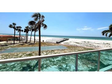 Enjoy direct beach views from this condo, with palm trees, shuffleboard, and pristine sand at 880 Mandalay Ave # N109, Clearwater Beach, FL 33767