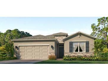 Charming single-story home with a neutral color palette, a two-car garage, and landscaped yard at 7783 Wheat Stone Dr, Zephyrhills, FL 33540