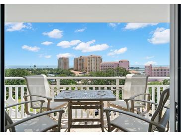Relax on this charming balcony with table and chairs and enjoy the spectacular views of the bay at 700 Beach Ne Dr # 803, St Petersburg, FL 33701