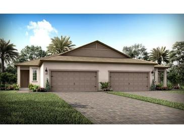 Charming single-Gathering home with a neutral color palette, three-car garage, and a beautifully paved driveway at 20423 Symphony Pl, Venice, FL 34293