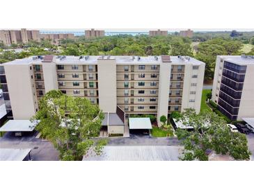 Spacious condo building offering covered parking and beautiful landscaping at 2700 Cove Cay Dr # 2B, Clearwater, FL 33760